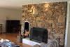 Basalt drystone appearance with hand-chiselled sandstone hearth stone fireplace
