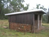Rubble coursed basalt horse shelter