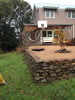 Drystone basalt retaining wall with flying steps